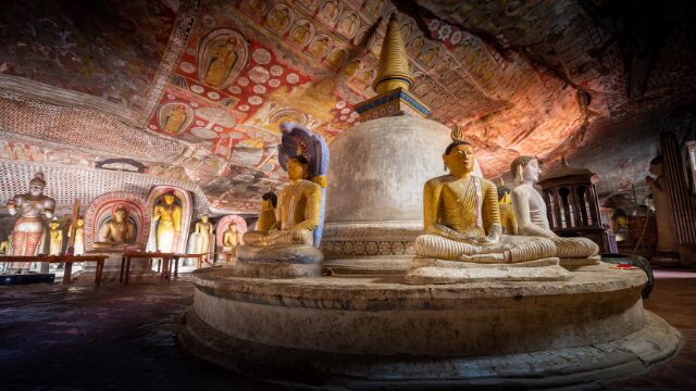 Inside the Dambulla Cave Temple, Sri Lanka’s largest and best-preserved cave temple complex. Over 2,000 years of devotion echo through these sacred halls, where golden Buddha statues and vibrant murals adorn every inch of stone. A true masterpiece of spiritual art and history.
