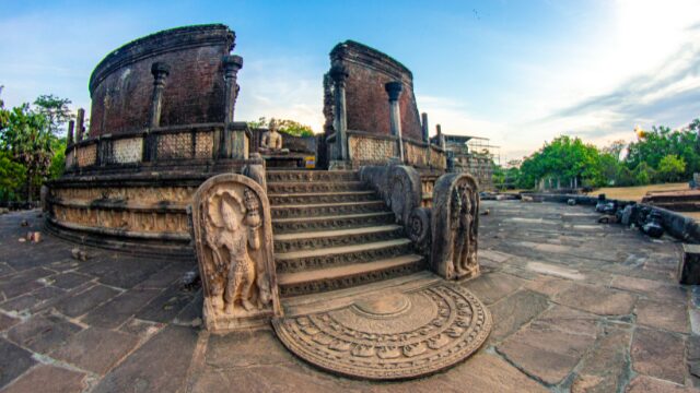 The beautifully preserved Vatadage of Polonnaruwa, a circular relic house adorned with intricate moonstones, stone carvings, and guardian figures — a timeless symbol of Sri Lanka’s medieval craftsmanship and sacred architecture.